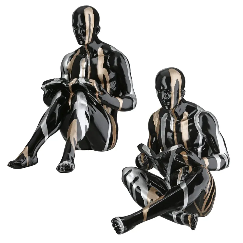 Buchstützen – Personenform, Schwarze Metalloptik, Silberne Linien, Höhe 22,5 cm - Drip | Gilde